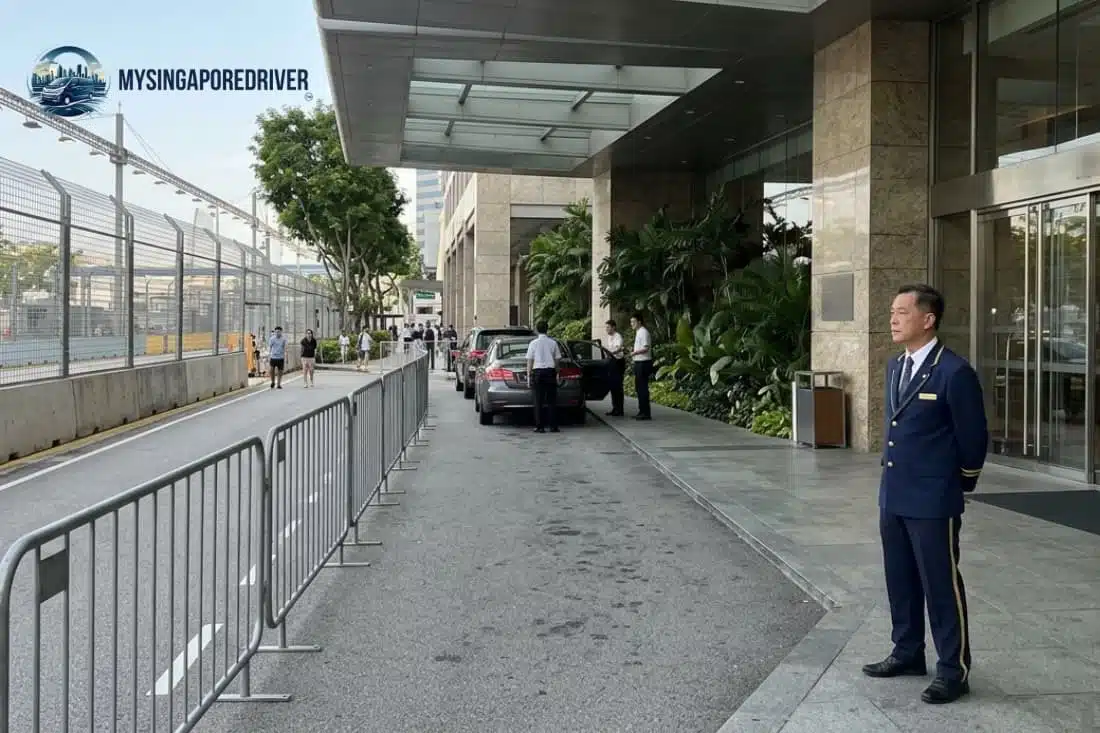 Hotel doorman and cars at a restricted drop-off zone outlined in the Singapore Grand Prix Road Closures 2026 guide